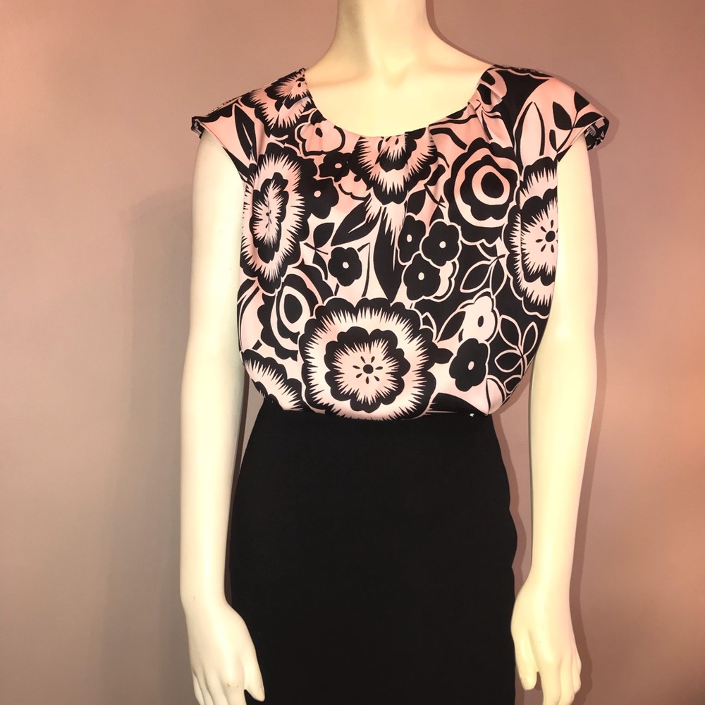 Super cute blush and black print blouse.